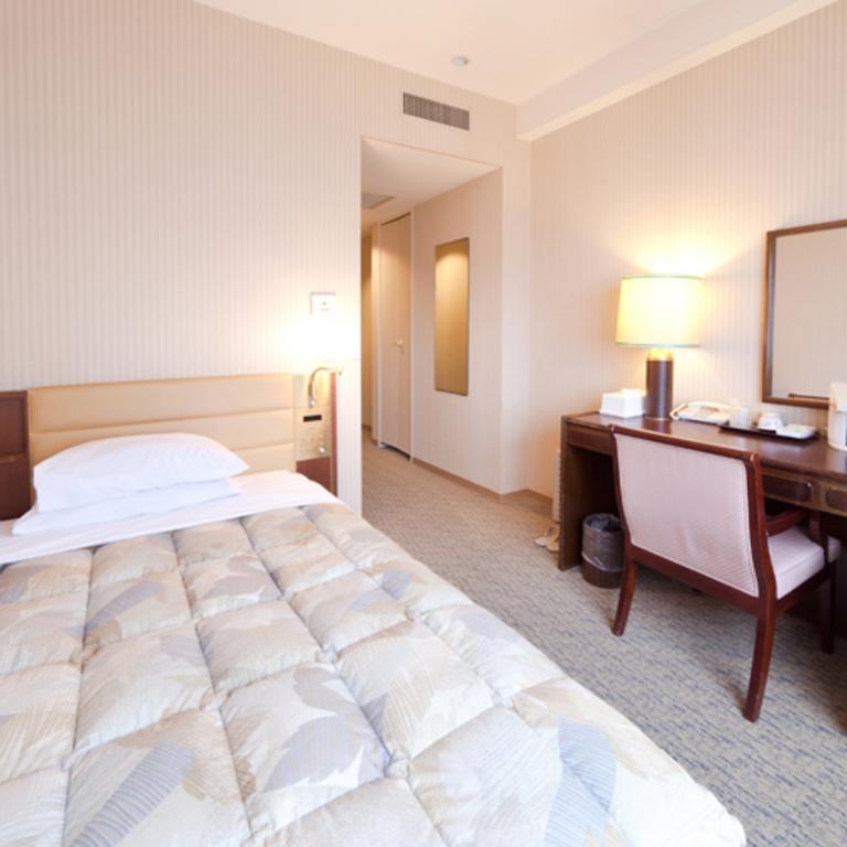 Hotel Grand Terrace Toyama Station Quarto foto
